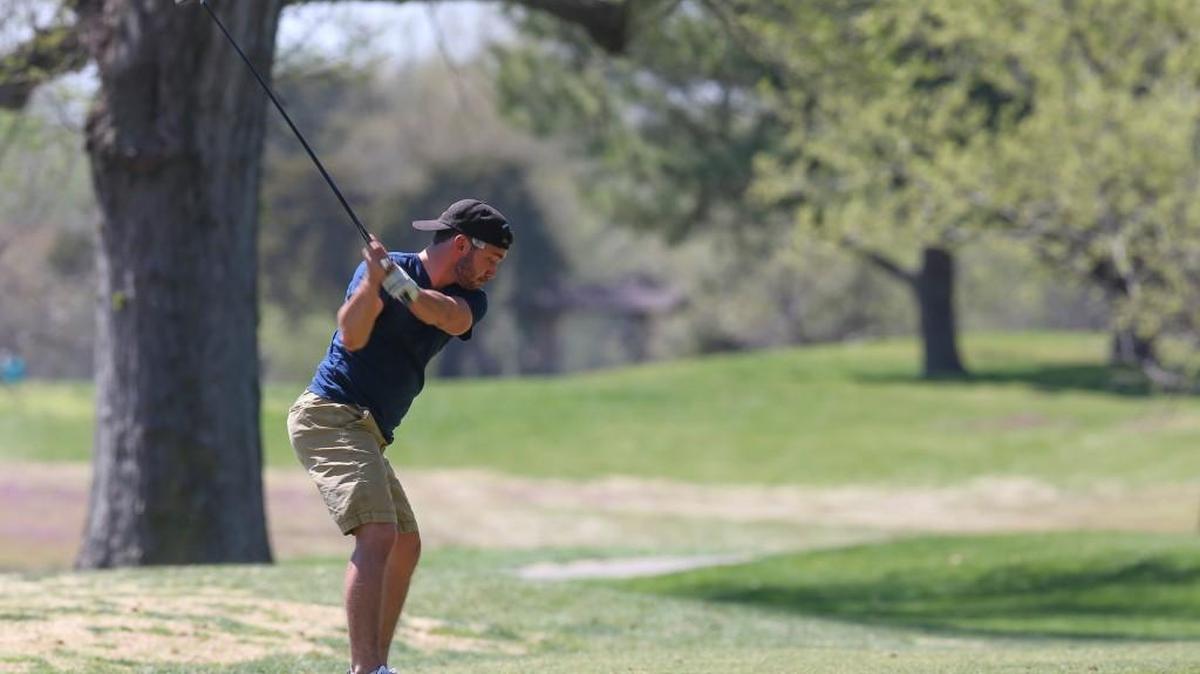 A golfer tees off at Sim Park Golf Course. The $50 PGA Golf Pass offers discounted play at 85 golf courses in Kansas, Oklahoma and Arkansas.