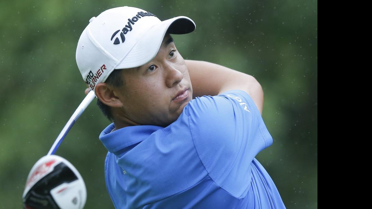 
Collin Morikawa tees off in the rain during the final round of the 112th Trans-Mississippi Championship at Flint Hills National Golf Club on Thursday. Morikawa, who recently graduated from high school, shot three straight rounds of 64 to win the tournament by seven strokes over second place finisher Philip Barbaree.
