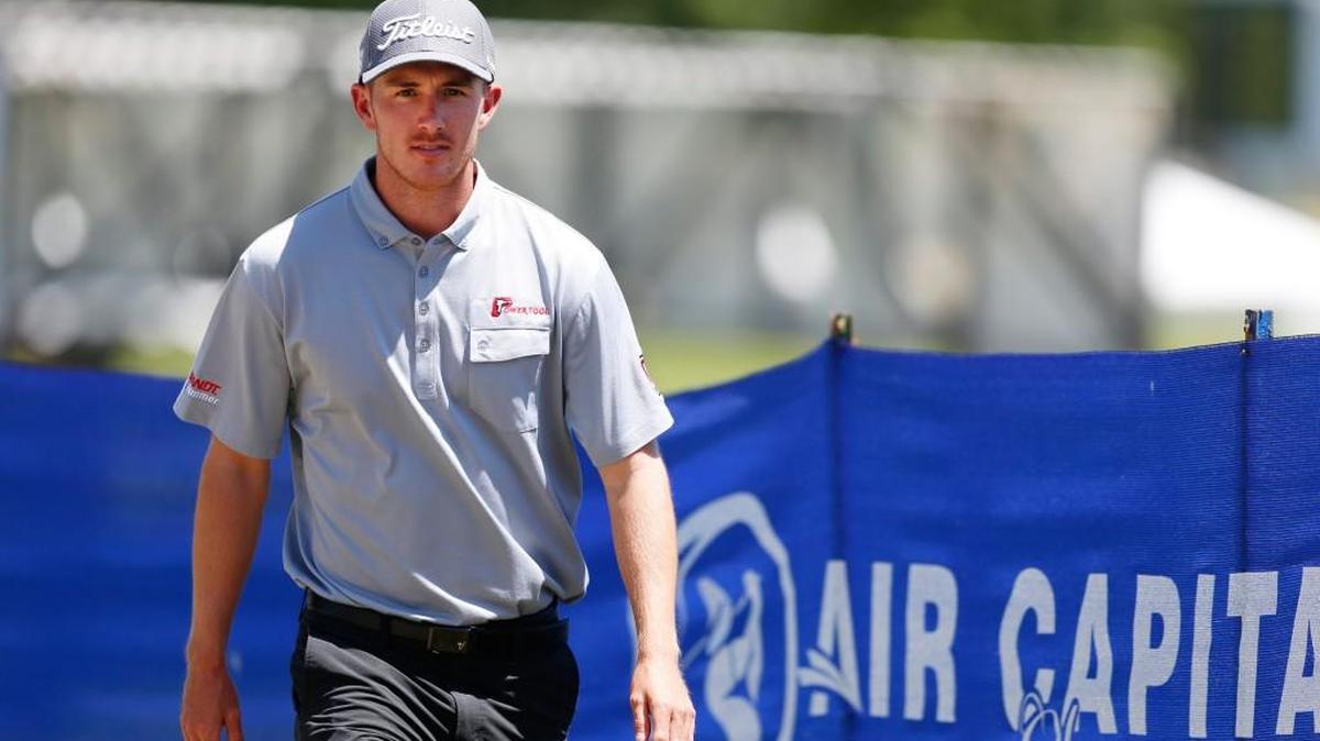 Ethan Tracy walks the Crestview Country Club course on Wednesday.