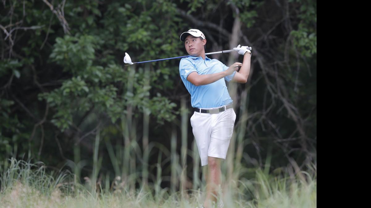 
Collin Morikawa tees off on the third hole during the second round of the 112th Trans-Mississippi Championship at Flint Hills National Golf Club on Wednesday.
