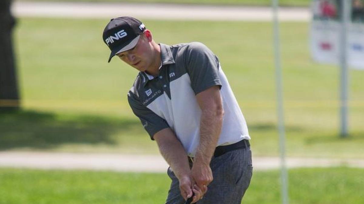 Brian Campbell chips onto the green on No. 18 during the third round of the Air Capital Classic on Saturday.