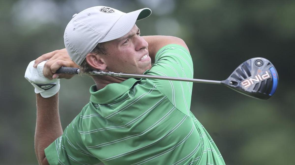 
Sam Stevens tees off on the 10th hole during the second day of qualifying at the Kansas Amateur tournament at the Wichita Country Club. 
