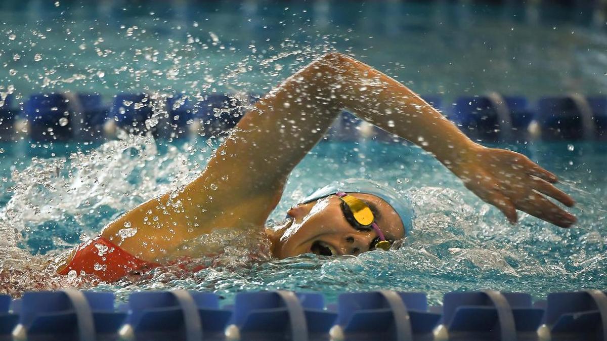 Wichita East's Astrid Dirkzwager competes in the 200 yard freestyle in Topeka