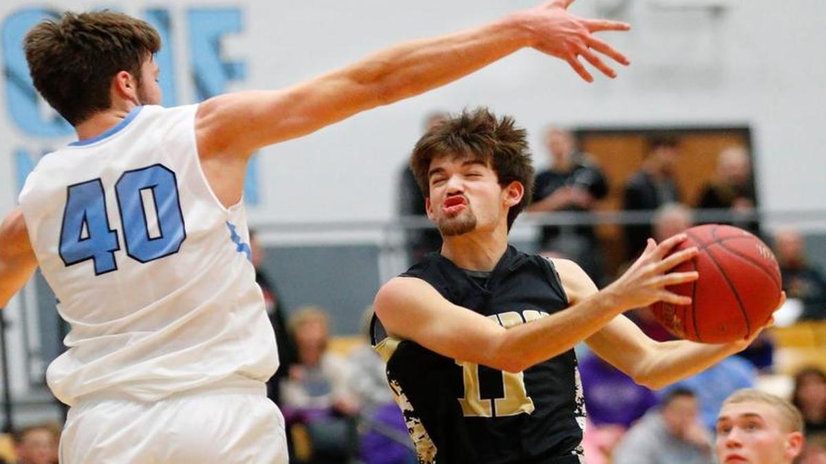 Andover Central's Travis McCray (11).