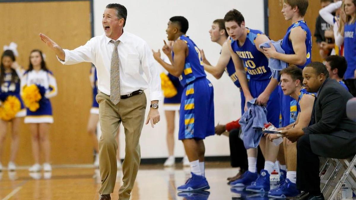 Collegiate coach Mitch Fiegel yells instructions to his team during a game against Clearwater in December 2015.