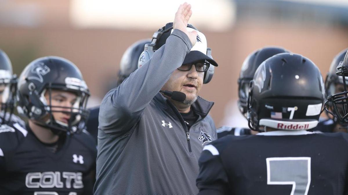 Campus coach Greg Slade talks to his team during their game against Maize at Campus. (October 7, 2016)