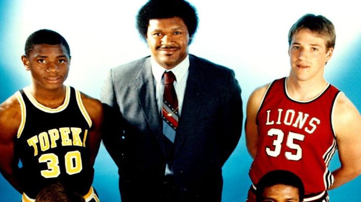 
Chic Downing of Atchison High was The Eagle’s Kansas Coach of the Year in 1986. With him are Topeka’s Tyrone Hudson (30), Lawrence’s Lee Stevens (35), McPherson’s Steve Henson (32), Atchison’s Dale Birch (12) and KC Schlagle’s Eddie Guinn (42).
