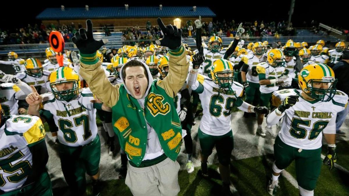 Carroll players celebrate their Class 5A semifinal win at Eisenhower. Carroll plays in the 5A title game on Saturday.