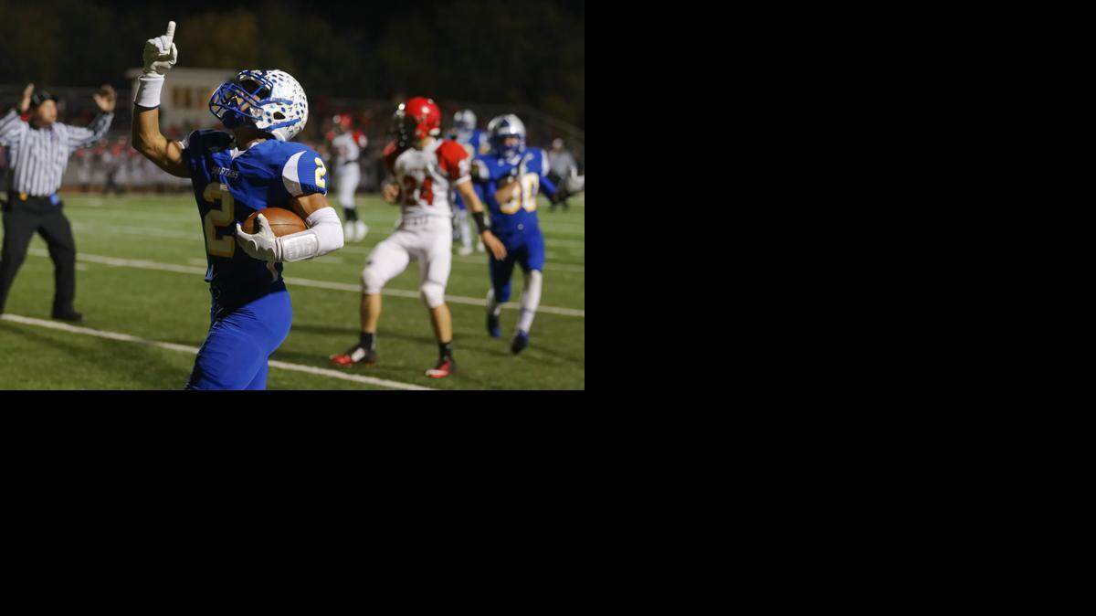 
Jaques Williams of Collegiate scores a touchdown in the first half in the Conway Springs-Collegiate first round of 3A playoffs Tuesday night.
