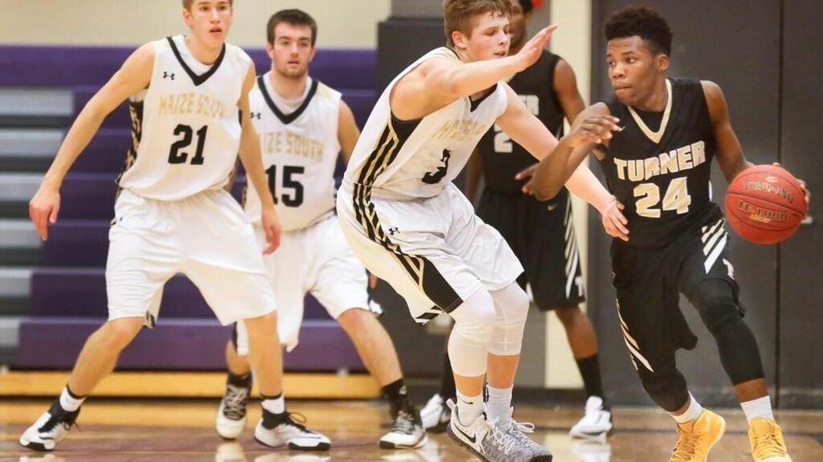 Maize South's Tristen Knoblauch (3) tries to defend against KC Turner's Russel Reed (24) on Thursday in Valley Center.