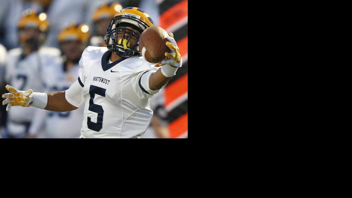
Northwest’s Karol Williams makes a one-handed catch for a touchdown in the first half Friday.
