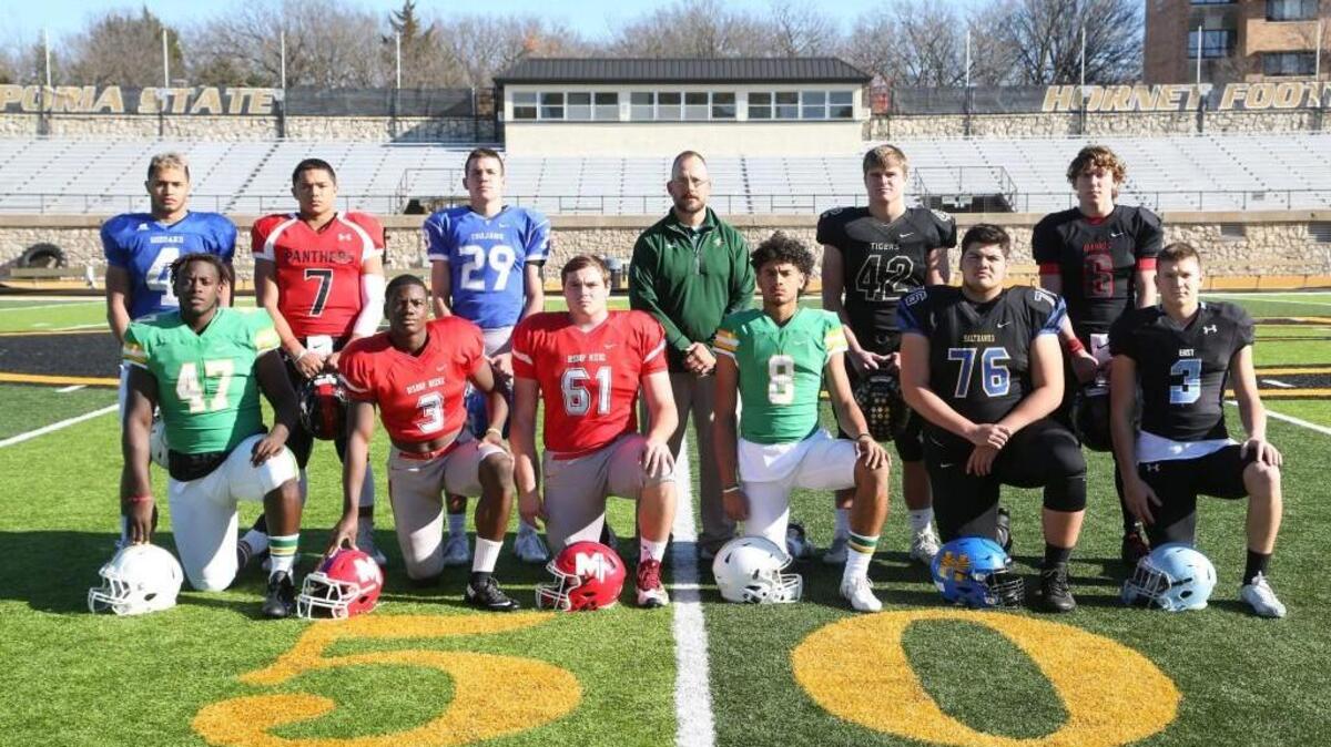 The 2016 Eagle Top 11 football team. Back row, from left: Kody Gonzalez, Goddard; Jacob Murray, Great Bend; Cutter Huss, Troy; Coach Jaime Cruce, Pratt; Michael Maffry, Blue Valley; Jacob Bradshaw, Rossville. Front row, Peerlus Walker, Derby; Jafar Armstrong, Miege; Colin Grunhard, Miege; Kenyon Tabor, Derby; Josh Rivas, Hutchinson; Trevor Thompson, Shawnee Mission East.