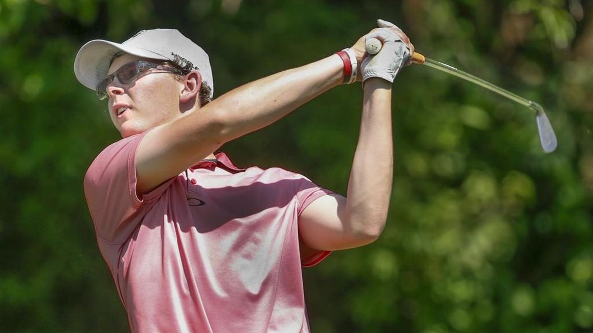 Rose Hill's Peyton Austin tees off on the 18th hole. Austin won the Class 4A boys golf regional at Tallgrass Country Club on Monday.