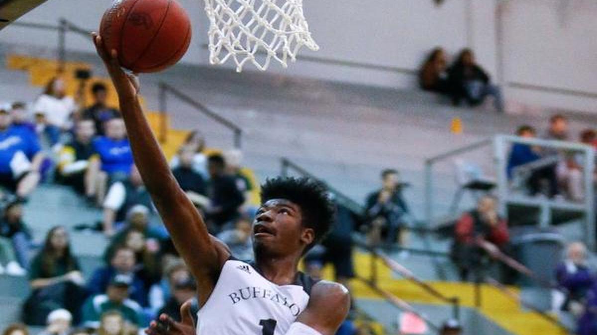 Wichita Southeast's Israel Barnes scores an uncontested layup during first half of Friday nights Topeka Invitational Tournament game against Highland Park at Topeka highHigh.Chris Neal/The Capital-Journal)