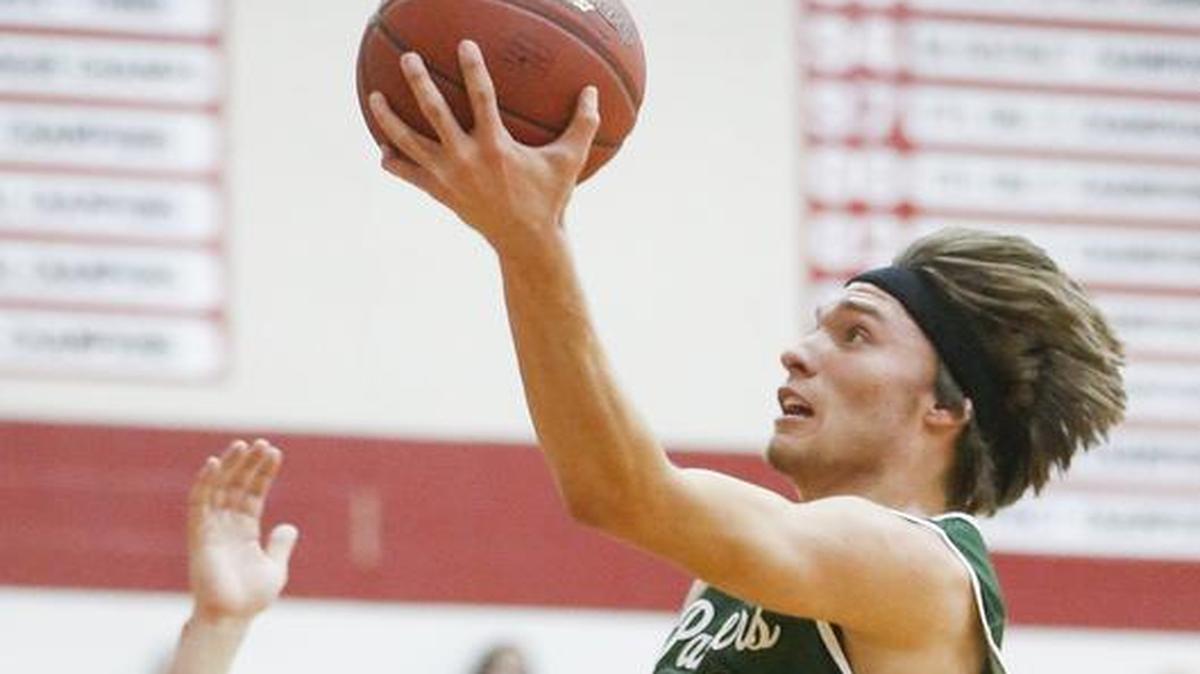 Derby’s Josh Clavin drives to the basket against Maize in the second quarter.