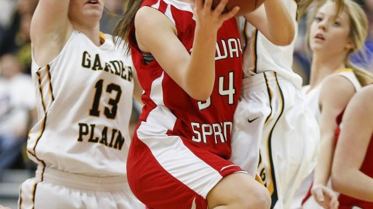 Conway Springs’ Halie Jones (34) goes up for two against Garden Plain in the second quarter Friday at Garden Plain High.