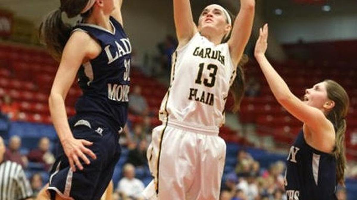 Garden Plain's Dylynn Doyle puts up a shot over TMP's Katelynn Zimmerman in the second quarter during Thursday’s Class 3A quarterfinal.