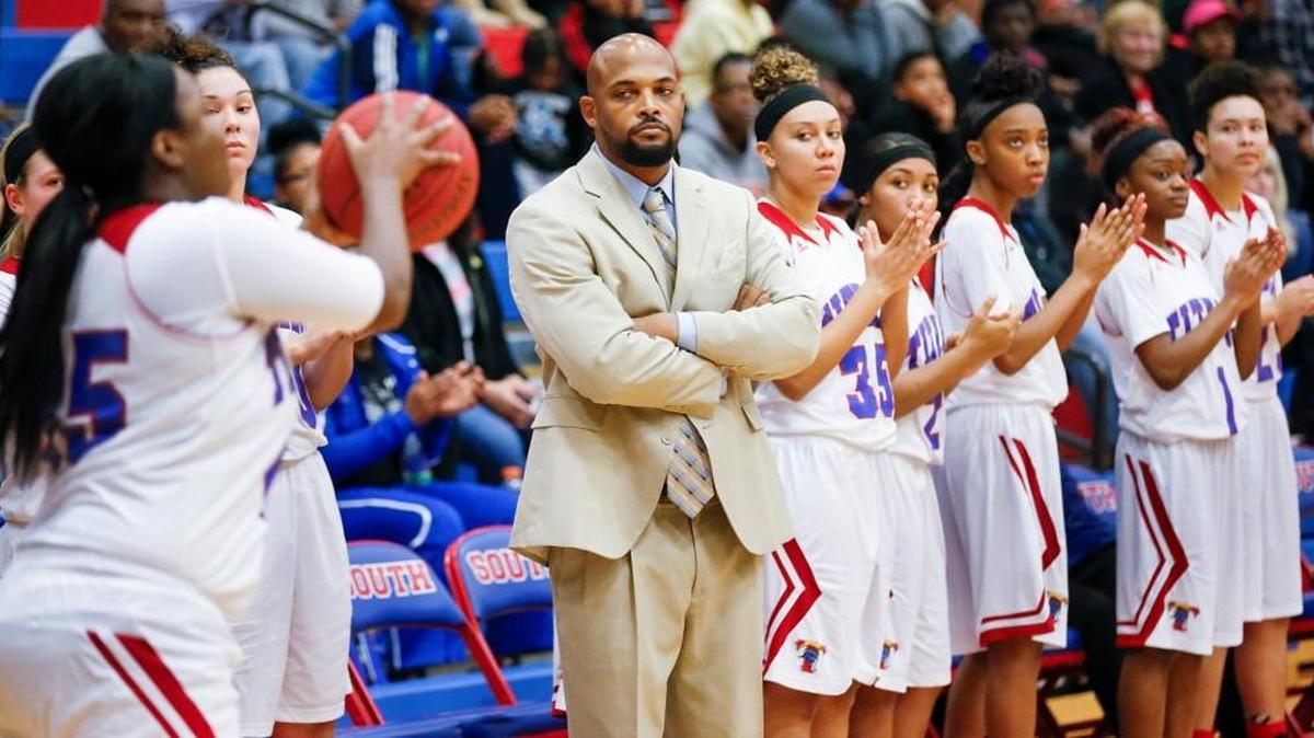 South coach Antwain Scales watches as his team finishes up a December victory over Heights.