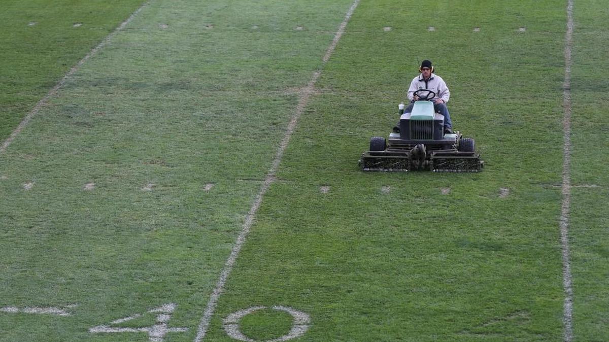 
Michael Dahr, the groundskeeper for the Andale and Garden Plain football fields, mows the Andale football field. Andale is one of two AV-CTL schools that still has natural grass. 
