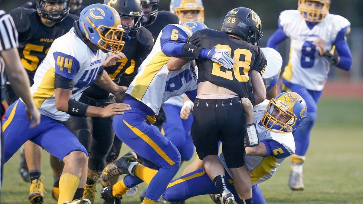 
The Chaparral defense gang up on Garden Plain's Nate Pauly in the first quarter at Garden Plain Friday. 
