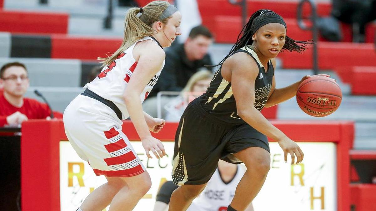 Andover Central’s Jewell Bolden brings the ball up court against Rose Hill’s Mackenzie Herman during the first quarter Tuesday at Rose Hill.