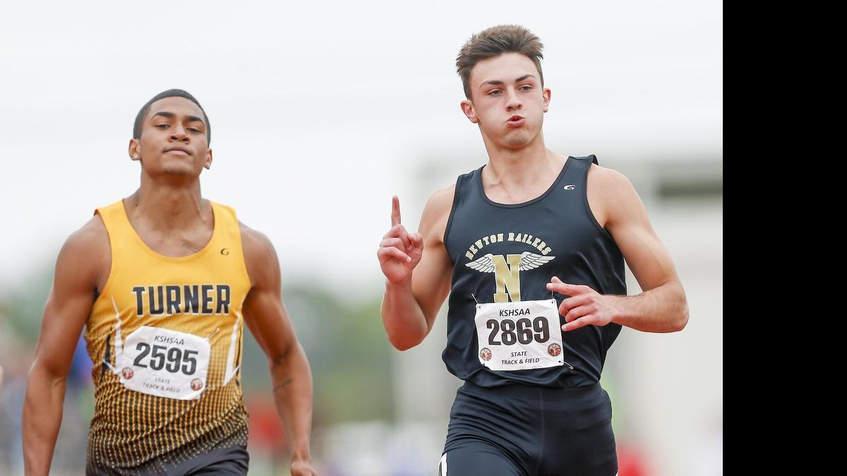 
Newton's Kaden Remsberg, right, wins the 5A 100 meter dash at the Track and Field State Championships at Cessna Stadium on Saturday.
