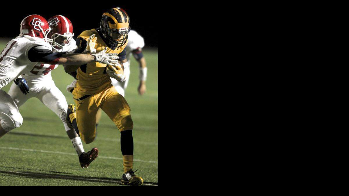
Wichita Northwest's KeShaun McGaugh runs for another touchdown in Friday night's game against Dodge City.
