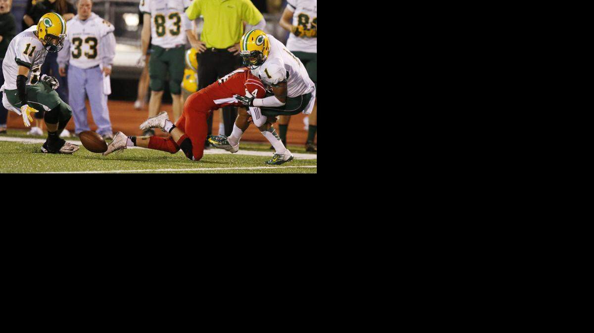 
Carroll’s Zach Sanders chases the ball after teammate Denzel Goolsby fumbled a punt against Maize on Friday.
