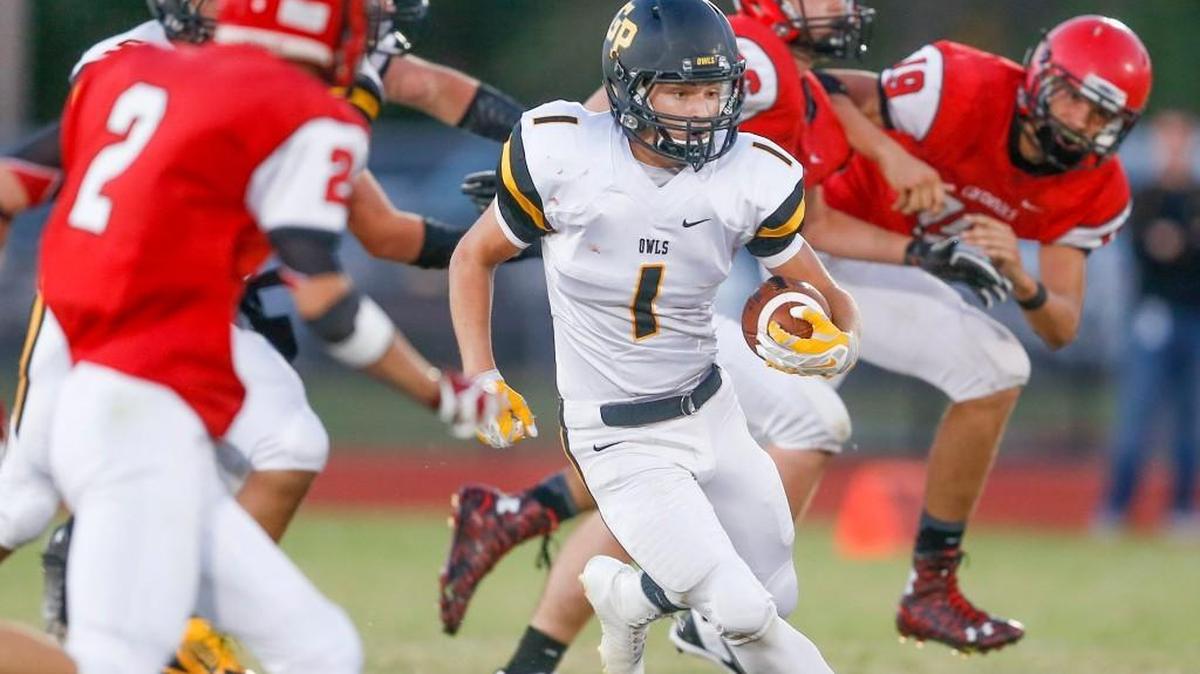 
Garden Plain’s Caleb Ellis (1) runs for daylight against Conway Springs last week.
