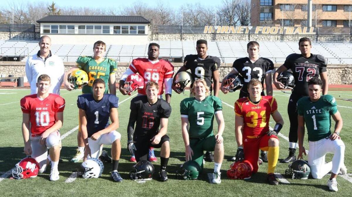 Front row: Dawson Downing, Bishop Miege, Christian Jegen, Mill Valley, Tucker Horak, Rossville, Brady Rust, Derby, Jace McDowns, Columbus and Bryce Torneden, Lawrence Free State. Back row: Coach of the year Brandon Clark, Derby, Noah Johnson, Bishop Carroll, Kaelin Key, Bishop Miege, Darraja Parnell, Andover Central, Ian Rudzik. Ulysses and Amani Bledsoe, Lawrence.