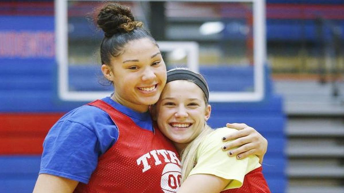 South High's Kendrian Elliott, left, and Ericka Mattingly have developed a deep friendship while winning three state championships together.