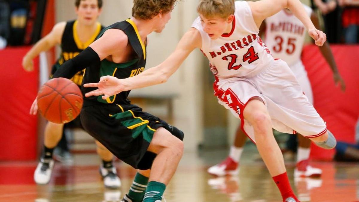 McPherson's Ben Pyle (24) steals the ball from Carroll's Patrick Carney in January. McPherson is 19-1 but would face a sub-state finals opponent with no more than five losses.