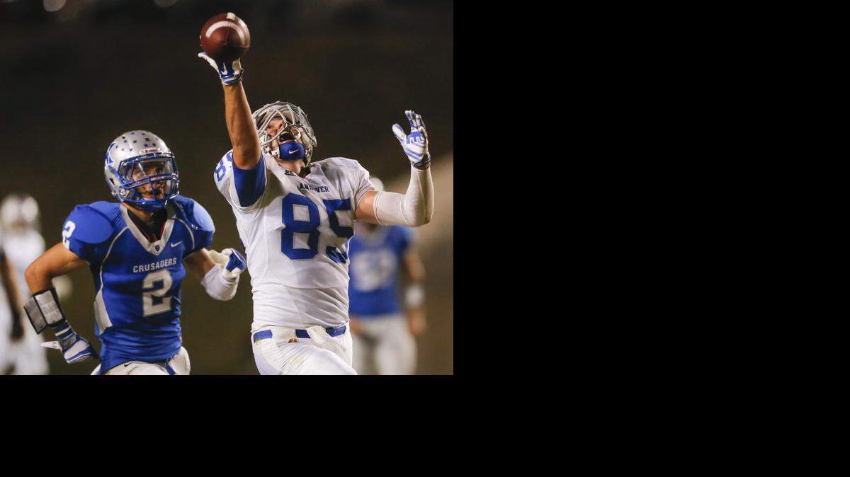 
Andover's Zach Seabrook can't haul in the pass while Kapaun’s Edgar Baez tries to cover on Friday night at Cessna Stadium.
