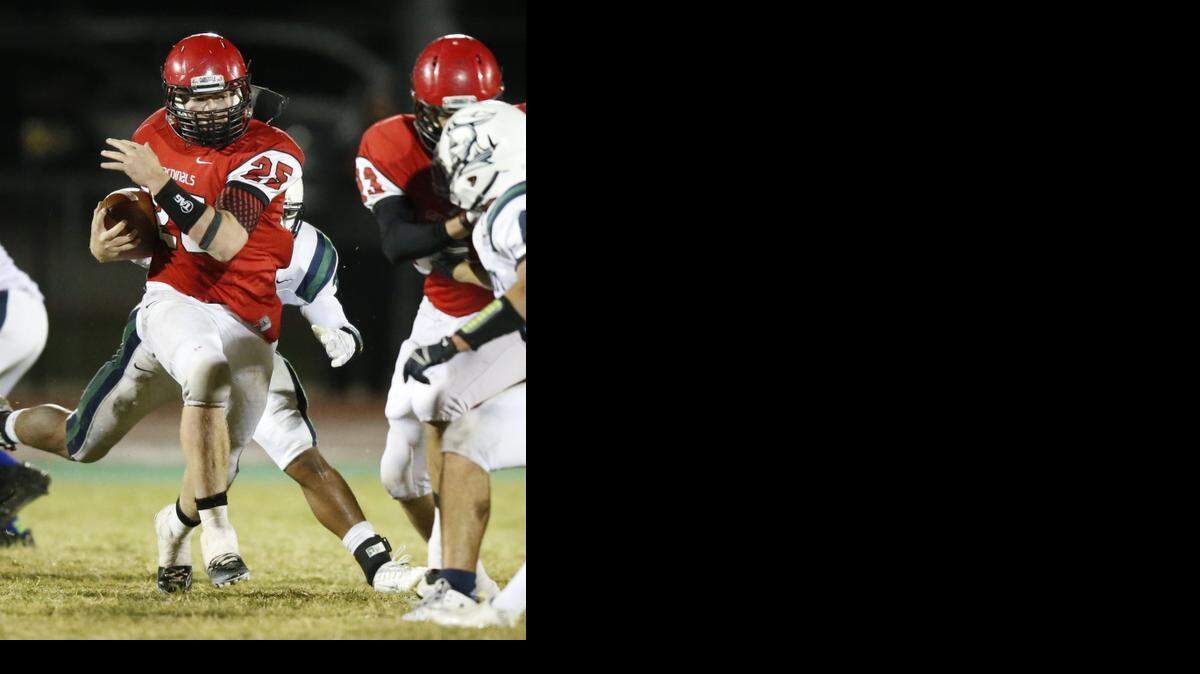 
Conway Springs’ Luke Fisher runs for yardage Friday night against Trinity Academy.
