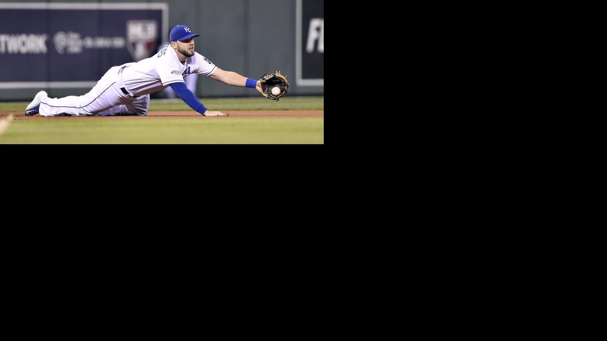 
Royals third baseman Mike Moustakas made a diving stop of a hard ground ball in the first inning of Game 7.
