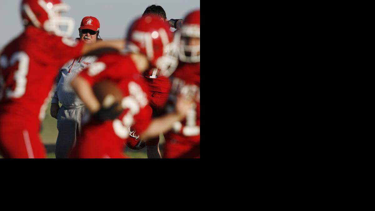
Smith Center football coach Roger Barta watches his team work out in 2007.
