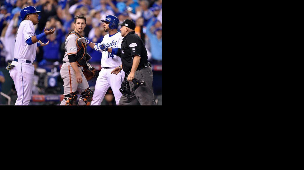 
Kansas City Royals catcher Salvador Perez was confused by home plate umpire Eric Cooper's warning to him while Kansas City Royals second baseman Omar Infante came in on a home run he hit in the sixth inning that drove in Perez in game two of the World Series on Wednesday. Cooper had advised Perez to let Infante make it to base before coming out to greet him any closer.
