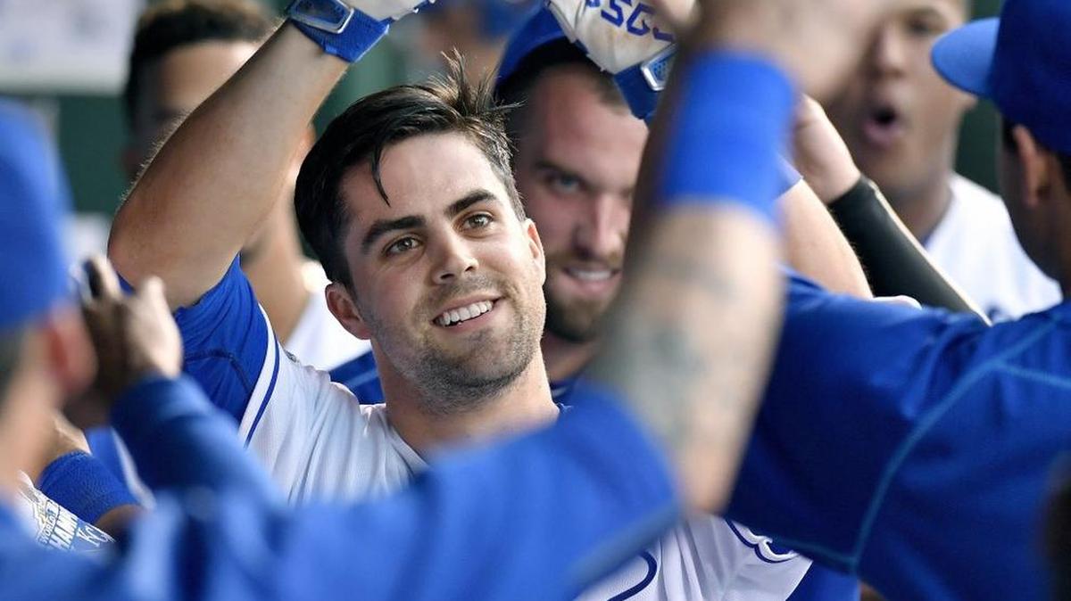 Kansas City Royals' Whit Merrifield is congratulated on a solo home run in the fourth inning during Monday's baseball game against the Cleveland Indians on Monday at Kauffman Stadium in Kansas City, Mo.