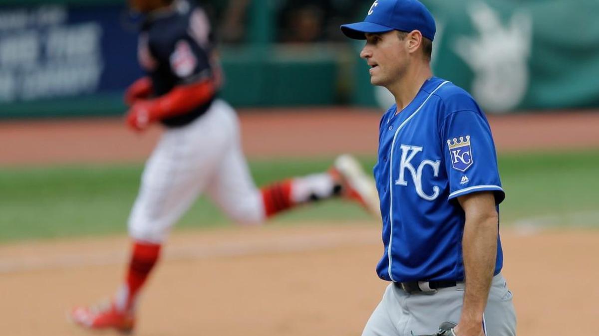 Kansas City Royals starting pitcher Chris Young, right, waits for Cleveland Indians' Francisco Lindor, left, to run the bases after Lindor hit a solo home run in the fifth inning of a baseball game, Sunday, June 5, 2016, in Cleveland.