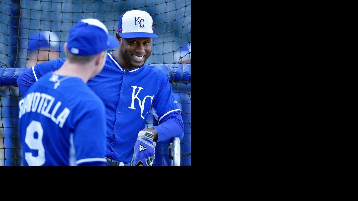 The Kansas City Royals' Lorenzo Cain enjoys a joke with Johnny Giavotella (9) during practice on Friday, Oct. 17, 2014 at Kauffman Stadium in Kansas City, Mo. The Royals play host to the San Francisco Giants in Game 1 of the World Series on October 21. (John Sleezer/Kansas City Star/MCT)