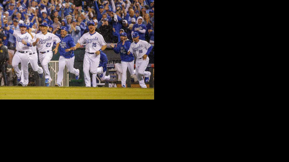 
Royals players erupt from the dugout following the end of Sunday’s sweep of the Angels at Kauffman Stadium.
