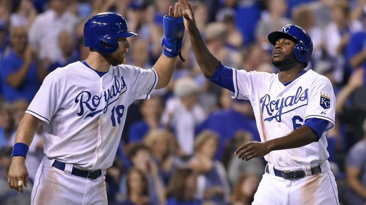 
The Royals' Lorenzo Cain (6) and Ben Zobrist (18) celebrated scoring on a single by Mike Moustakas during Thursday's baseball game against the Mariners at Kauffman Stadium.
