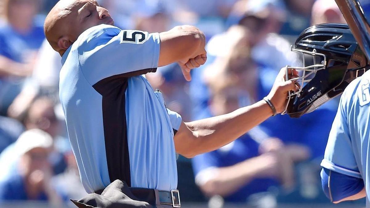 Home-plate umpire C.B. Bucknor ejects Royals first baseman Eric Hosmer from the dugout in the sixth inning during Wednesday's 13-2 loss to Washington at Kauffman Stadium.