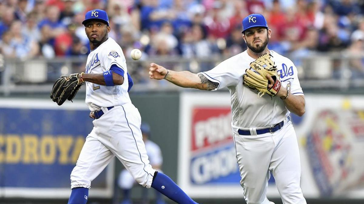 Mike Moustakas, right, is the Royals’ most valuable trade asset.