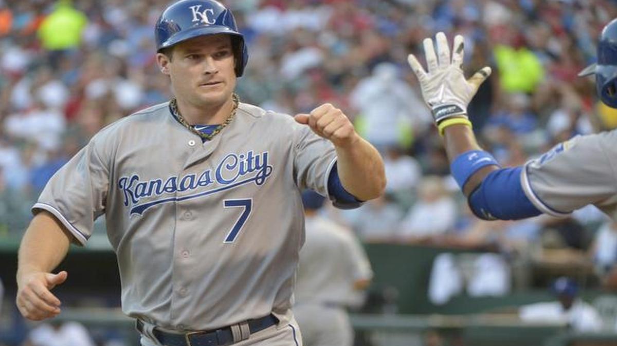 
Josh Willingham heads to the dugout after scoring on a single by Lorenzo Cain during the second inning Friday against the Texas Rangers. Willingham later homered.
