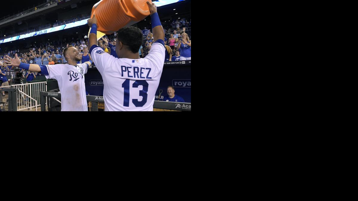 
Kansas City’s Alex Gordon gets doused by Salvador Perez soon after hitting the game-winning two-run home run during the ninth inning against Minnesota on Tuesday in Kansas City, Mo. 
