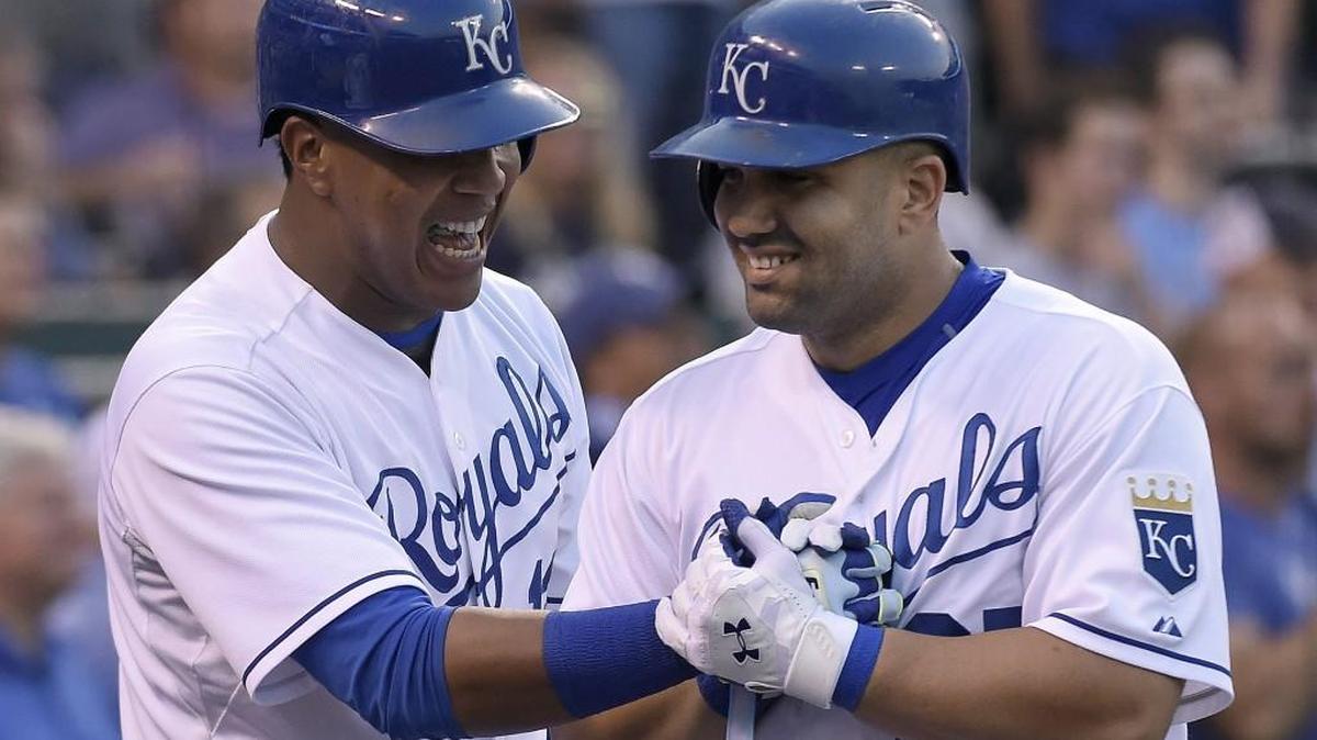 
Salvador Perez, left, congratulates Royals DH Kendrys Morales after Morales’ solo home run in the second inning Tuesday at Kauffman Stadium in Kansas City, Mo.
