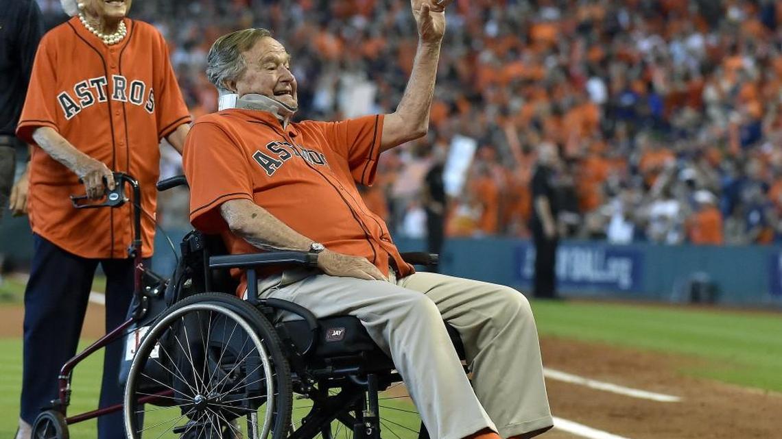 
President George H.W. Bush throws out the first pitch with his wife Barbara before Sunday's ALDS baseball game between the Houston Astros and Kansas City Royals on October 11, 2015 at Minute Maid Park in Houston.
