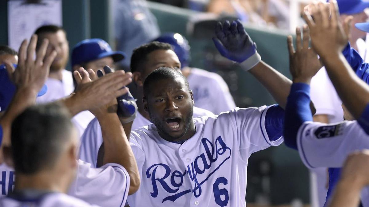 
Lorenzo Cain celebrates his home run against the Tigers after returning to the Royals dugout in the sixth inning Tuesday night at Kauffman Stadium. Cain had four hits. 
