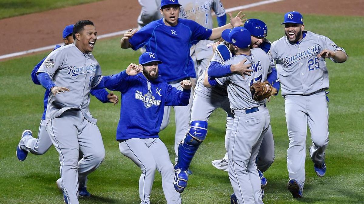 The Kansas City Royals rush to relief pitcher Wade Davis to celebrate after defeating the New York Mets 7-2 to win the World Series on Nov. 1 at Citi Field in New York.